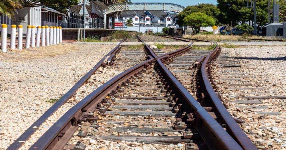 The access track leading to Knysna railway station in the Western Cape, South Africa — rails ending at a small-town terminus far from anywhere